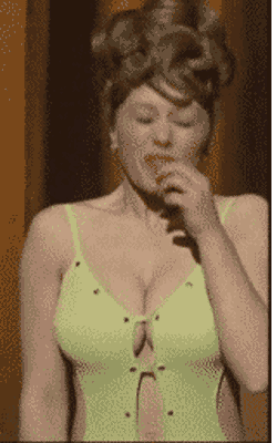 woman sneezing - A beautiful woman sneezing