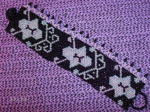 Butterfly Cuff - My attempt at the peyote stitch. Not too bad if I say so myself. If interested in purchase or ordering from my collection. Leave a private message and I will get back to you. See ya.