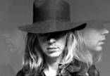 Beck - B&W head shot of beck wearing a fidora