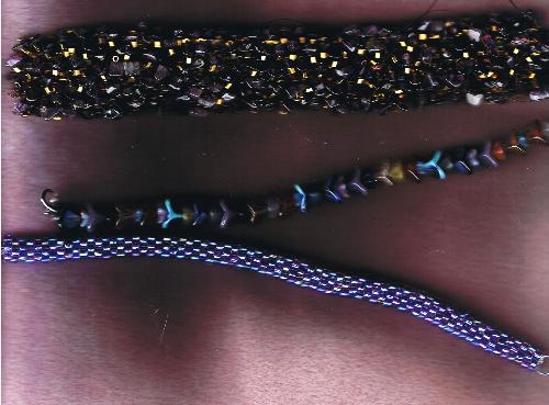 bracelets - this has some of my bead weaving on it - sorry for the bad pix