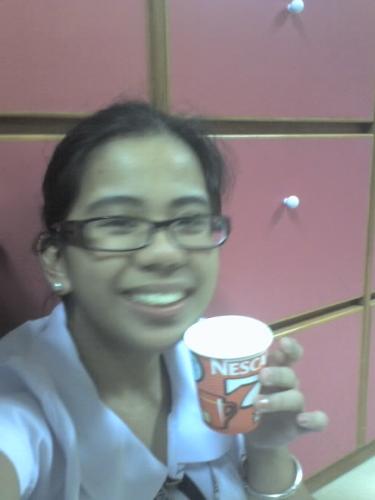 coffee in school - i'm really more of a coffee person and here i am with a cup while in school.