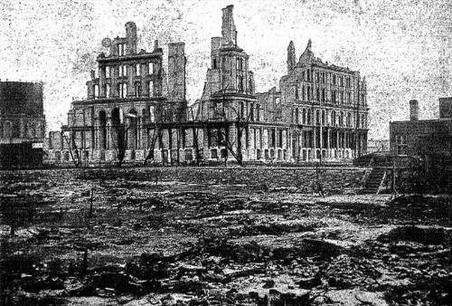 the Great Chicago Fire - An old photo from after the Great Chicago Fire, az you can see most of the city had burned to the ground. All this though led to a speedy recovery for the city and a double in growth rate.
