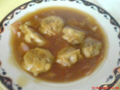 sweet and sour meatballs (tempura style) - beef meatballs coated with flour and deep fried like shrimp tempura with sweet and sour sauce