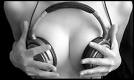 breast headphones - A pair of breasts wearing headphones