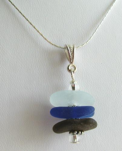 Ocean View Stacked Sea Glass Necklace - Currently a reserved order in Etsy.com shop, this 'stack' style necklace is adorned by three pieces of sea glass (white, deep brown and a rare piece of cobalt blue) The stack hangs on a 18' sterling silver chain.