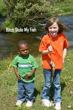 funny black kid  -  she stole his fish