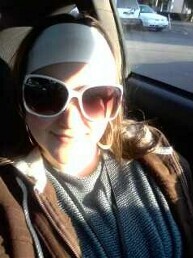 Me - Me in my big white $5 sunglasses! Love these things! Got them in a going out of business sale on the Vineyard.