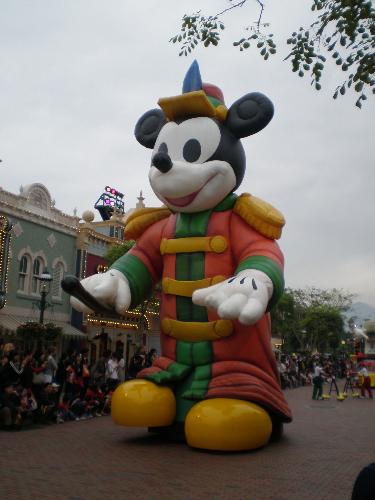 A large Mickey Mouse - This large Mickey Mouse is walking along the street in HK Disneyland to be viewed by everyone.