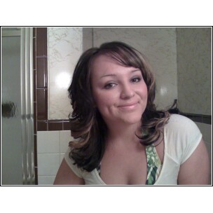 Debra posing in her grandmother's bathroom - She takes a lot of photos of herself, testing out new looks, etc. This is one of them she took when she was living with Mom instead of living with Mom.