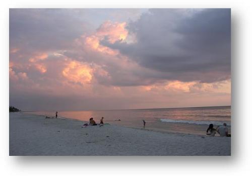 beach - Beautiful springtime sunset Fort Myers Beach FL. Another one of God's awesome works of art. This was taken with a Canon point and shoot.