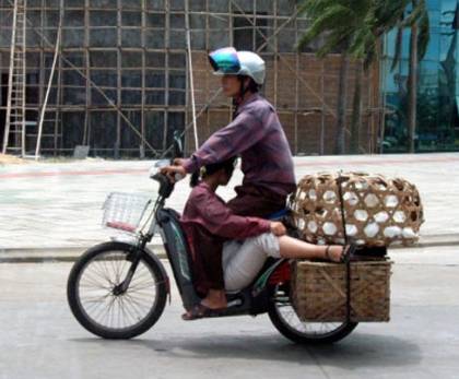 whats she doing there? - oh! i found it!!she is sitting,he he...hmmm...its just another consequence of rise of fuel rates...they are economical!!