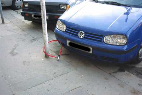 what a security!?!?! - some people are really crazy...look at the car and its lock...it will take not time it break the lock...may be its just for fun!!