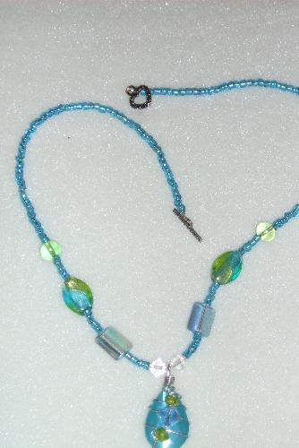 Blue Green necklace - One of my daughters favorite peices that I have made. She love the wire on the center peice.