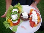 Theres more uses than I originally thought - Picture of hands holding a dish with vegetable and fruit and cottage cheese dipped on top