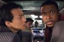 Chan no fan of 'Thank You' - Picture of Chris Tucker and Jackie Chan, chan looking at tucker in worry and tucker looking in shock to the back of the car in a scene of Rush Hour