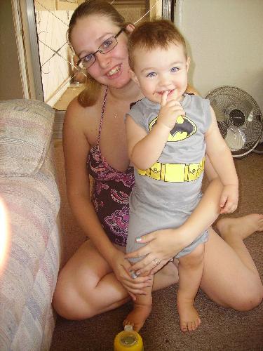 me and my boy - my mother got my son tristan this outfit because her husband loves batman. So when we put it on him we had to take tons of pics.