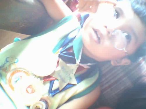 Genius - This still is my brother. is it obvious that he is my favorite? we played with the camera, propped him with medals and eyeglasses. he'll turn out a genius, i'm telling you.