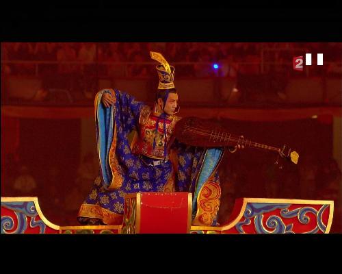 Opening ceremony of 2008 Olympic Games - This was not seen on tv, what a pity. I don't even know there's man standing on the top of the pillar