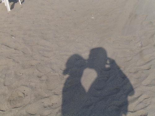 Kiss shadow - Our kiss reflection on the sandy beach at Olympic Beach in Greece (July, 2008)