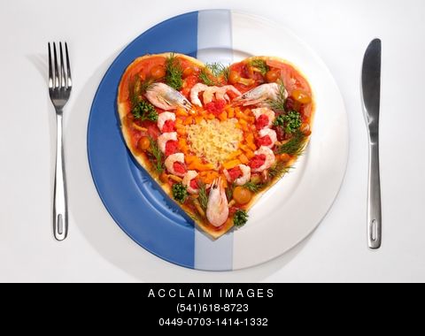 pizzas - This is a heart shaped pizza..