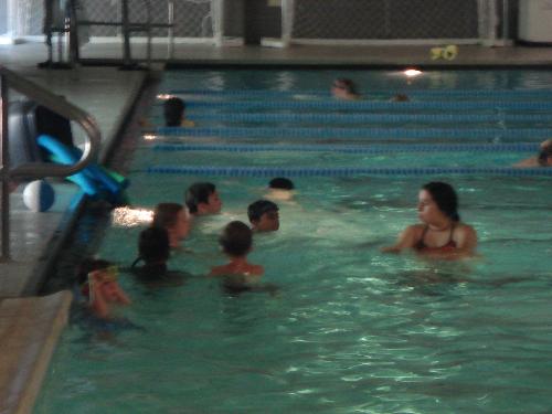Swimming Class - Maddy with his instructor and class.