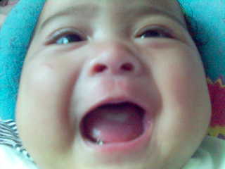happy moment - nearing milk time, that's why she's happy :p
