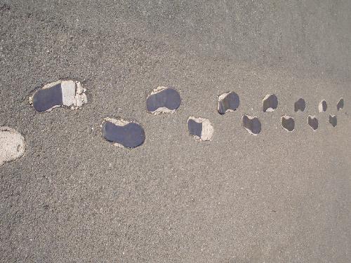 where am i? - footprints of a lady. wandering, isn't she? or is she lost?