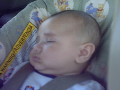Justin taken by GG Mary - Justin asleep in his carseet taken in June