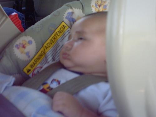 Justin taken by GG Mary - Justin half asleep and half awake in his carseet