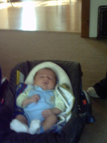Justin taken by GG Mary - Justin asleep in his carseet at Uncle Jimmy's and Aunt Cassie's