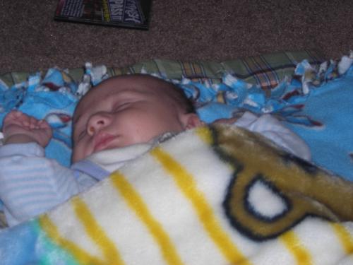 Justin taken by GG Mary - Justin asleep on his favorite blankets