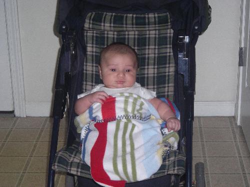 Justin taken by GG Mary - Justin sitting up in his stroller