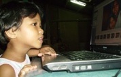 typing tutor - my three year old girl during her first typing lesson