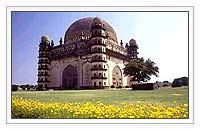 Gol Gumbaz - Gol Gumbaz, the second largest dome in the world is an astounding engineering feat. It is situated at Bijapur in Karnataka state of INDIA. It was built by king Mohammed Adil Shah in the 17th Century. Its enormous 'Whispering dome' is second in size only to St.peter's Basilica in Rome. The dome is 124 feet in diameter and second largest in the world. The dome stands unsupported by pillars. The fantastic acoustical system in the dome carries the faintest whisper around the dome and returns it to the listener nine times. Even the tick of a watch or the rustle of paper can be heard across a distance of 37 m in the whispering gallery. The gallery around the dome provides a fabulous view of the town. The architecture of this building is unique with the four minarets being the four staircases leading to the top dome.