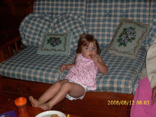 stephy - sitting on the couch this morning eating her breakfast!