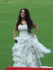 Sarah at the osaka opening - Sarah Brightman look smashing and beautiful in her white dress.