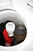 washing machine - photo of white washing machine filling with water
