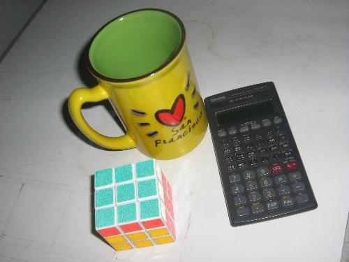 Materials for a Stay at Home Mom - A calculator, a coffee cup and a rubics cube. A strange combination at first , but not really. Calculator - to compute earnings at MyLot. (smiles), Coffee- needed while answering discussion to keep awake; rubics - to relax for a while when the eyes get tired.