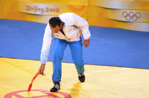 adam wheeler - as he puts down the medal
