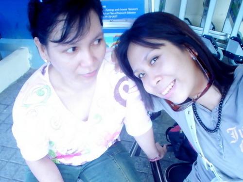 me and my daughter - we are at the airport. waiting for our flight for singapore. thats our first trip alone for out of the country. its very nice and really a bonding moment for us.