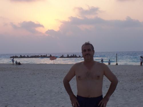 Me on the beach - It is my photo when I was on the beach with the sunset behind me