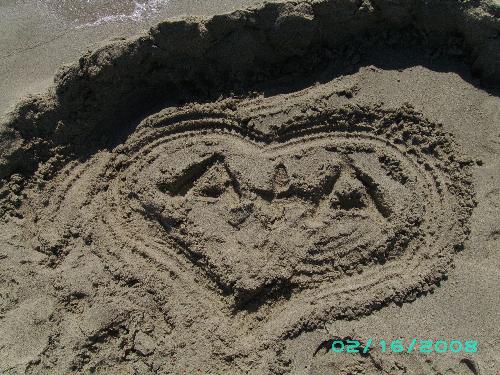 a+a - It represents the love between me and my girlfriend and those are the initials of our names. (Olympic Beach, july, 2008)