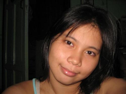 me - I took this picture here in Tondo while watching a DVD movie. Just trying to be a model, yeah right!