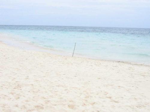 Camiguin - An uninhabited white sandbar where the view of towering Mt. Hibok-Hibok and Old Volcan reflects the grandeur the Province of Camiguin has ever achieved. It is reached within 10 minutes through light water transport from anywhere in Yumbing, Mambajao area.