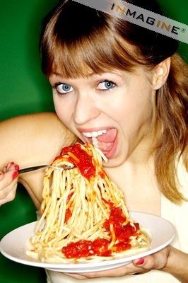 pasta - woman eating pasta.