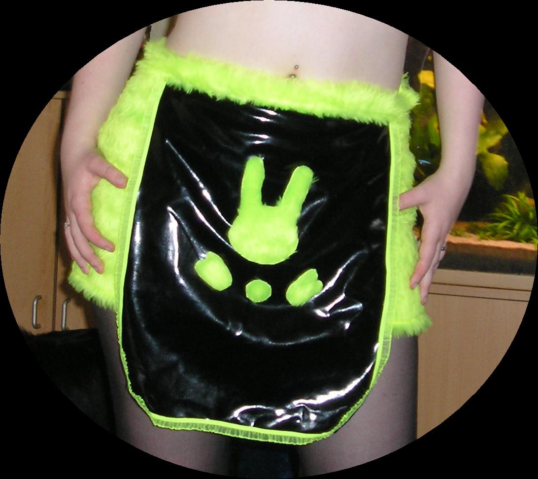 Space bunny skirt - made it myself! - I made this 'skirt' myself. It's actually a fluffy pair of hotpants with two flaps; one in front and one in the back. These flaps are made of PVC and have a neon yellow trim added to it. The little bunny it also made of fluffy (monster furr) fabric. It was one of my first tries at sewing clothing, and I'm very proud of it! ^_^