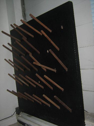 A chemistry class stand or glasswares - A stand for glasswares used in a chemistry class. This will dry the apparatus for subsequent sterilization.