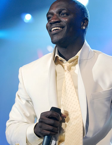 akon - Akon is an American hip hop singer and rose to fame in 2004 following the release of his single 'Locked Up' from his debut album Trouble. His second album, Konvicted, earned him a Grammy Award nomination for the single Smack That.