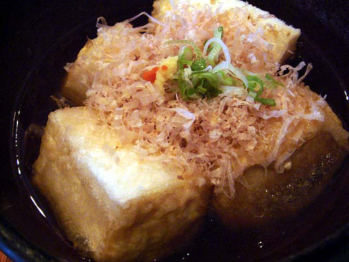 Tofu with fish floss sprinkled all over it! - MMMMMmmmmMMMMmmmm! Delicious fried tofu that is served with fish floss and drowned in a really tasty broth!