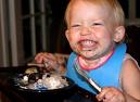ice cream - Child eating cake and ice cream ...